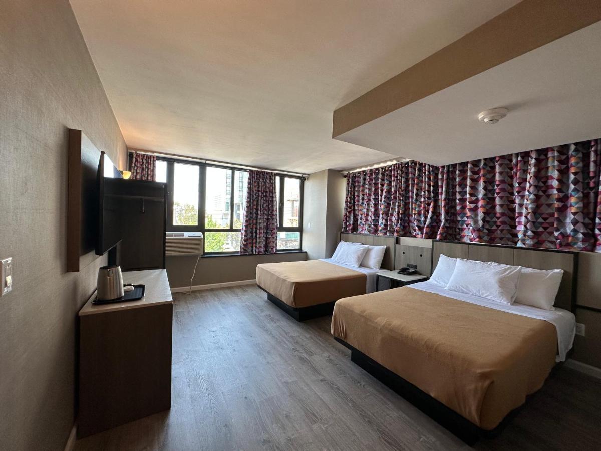 Regal Inn & Suites New York Laguardia Hotel Extérieur photo