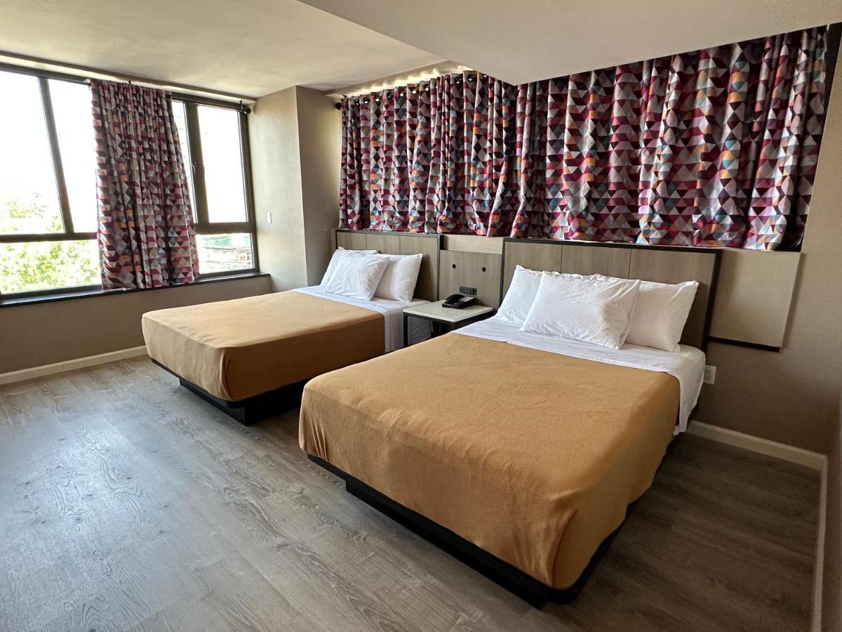 Regal Inn & Suites New York Laguardia Hotel Extérieur photo
